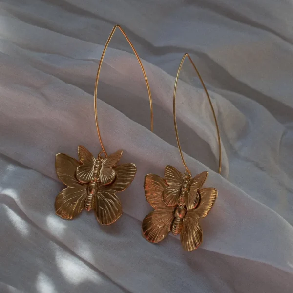 Lotta Djossou Boucles d'oreilles Double Papillon Dorées New